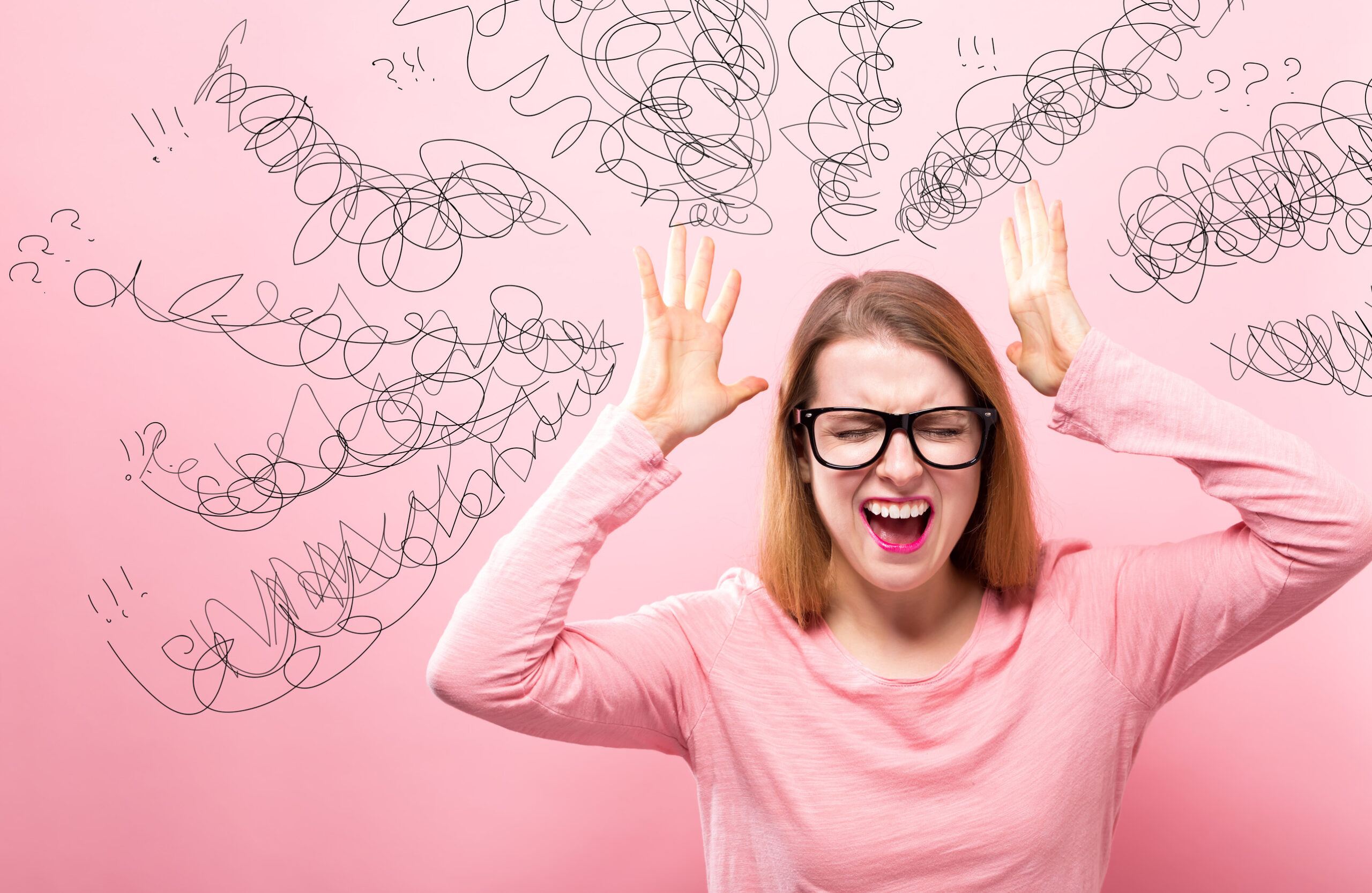 Woman confused and frustrated with understanding which type of orthodontic appliance to use. See an AAO orthodontist for help!